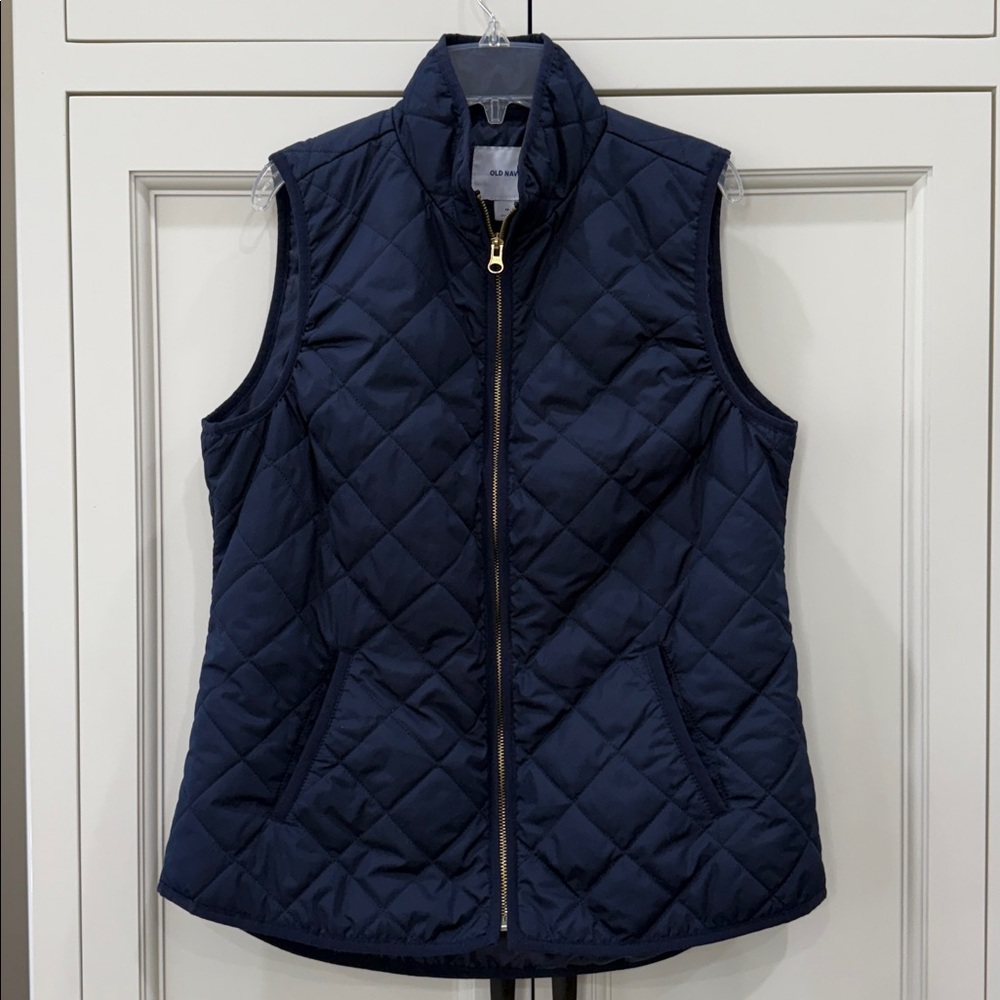 Old Navy Quilted Puffer Vest in Navy Blue with a full gold zipper Womens medium